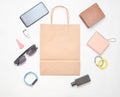 Paper bags and many purchases of gadgets and accessories on white background Royalty Free Stock Photo