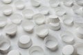 Paper baking molds for cupcakes or muffin on white table.