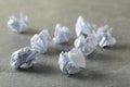 Paper balls on grey table Royalty Free Stock Photo
