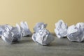 Paper balls on grey table Royalty Free Stock Photo