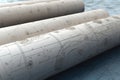 paper blueprints in rolls isolated illustration. Generative AI Royalty Free Stock Photo