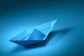 Paper boat sailing. Paper boat blue color on sea wave metaphor. Blue ship sailboat Royalty Free Stock Photo