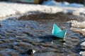 Paper boat in a pool Royalty Free Stock Photo