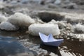 Paper boat in a pool Royalty Free Stock Photo