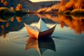 paper boat on the river among the mountains. Royalty Free Stock Photo