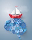 paper boat sailing float on the brain gear Royalty Free Stock Photo