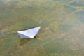 White paper boat on water Royalty Free Stock Photo