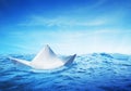 Paper boat at sea on a shiny day Royalty Free Stock Photo
