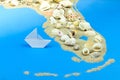 Paper boat stands off the coast of Florida