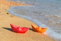 Paper boats at the beach Royalty Free Stock Photo