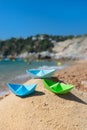 Paper boats at the beach Royalty Free Stock Photo