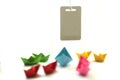 Paper boats. Origami colorful paper ships with blank tag memo or text design.