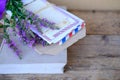 paper book, old photographs, home archive, letter on old wooden table, touching objects of nostalgia, past love, bunch of wild Royalty Free Stock Photo