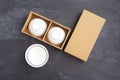 Paper box package mockup with white bowl Royalty Free Stock Photo