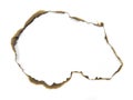 Paper burns on white backgrounds. close up hole paper with edges burned on white background. Royalty Free Stock Photo