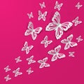 Paper butterflies fly on wall in different directions