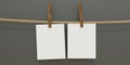 Paper card hang with clothespin. Blank memo note, reminder on black. Advertise template. 3d render Royalty Free Stock Photo