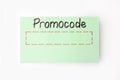Paper card with words Promo Code on white background, top view