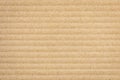 Paper cardboard background. Natural corrugated carton sheet. Kraft cardboard texture with horizontal stripes Royalty Free Stock Photo