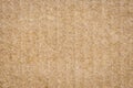 Paper cardboard background. Top macro view of natural corrugated carton sheet. Kraft rough cardboard texture close-up Royalty Free Stock Photo