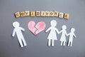 Paper chain cut family with broken heart on gray background. divorce in the covid pandemic Royalty Free Stock Photo