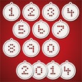 Paper christmas balls with puched numbers Royalty Free Stock Photo