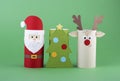 Paper Christmas crafts for children on a green background Royalty Free Stock Photo