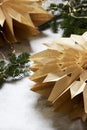 Paper Christmas stars made from craft bags. Royalty Free Stock Photo