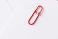 Paper clip with blank white business card Royalty Free Stock Photo