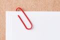 Paper clip with blank white business card Royalty Free Stock Photo