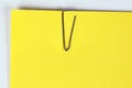 Paper clip holding on blank colour paper text Royalty Free Stock Photo
