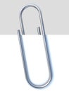 Paper clip holding a blank paper Royalty Free Stock Photo