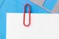 Paper clip with blank white business card Royalty Free Stock Photo