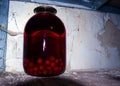 A jar of cherry compote will be stored in the cella Royalty Free Stock Photo