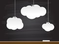 Paper clouds on chalkboard. Vector illustration.