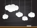 Paper clouds on chalkboard. Vector illustration.