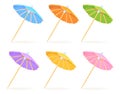 Paper cocktail umbrellas. Small colorful umbrella on toothpick for sweet drinks and summer beverages, decoration parasol Royalty Free Stock Photo