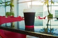 Paper coffee cup mock up template over modern background Royalty Free Stock Photo