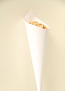 Paper cone with salted peanut isolated white background Sao Paulo Brazil Royalty Free Stock Photo