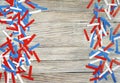 Paper confetti of national colors of France, Russia, USA, Serbia white-blue-red on a white wooden background, the concept of indep Royalty Free Stock Photo