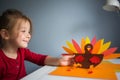 Paper craft for kids. DIY Turkey made for thanksgiving day. create art for children. Royalty Free Stock Photo