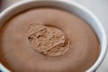 Paper cup with chocolate ice cream, just out of the freezer Royalty Free Stock Photo