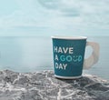 A paper cup of coffee with the word Royalty Free Stock Photo