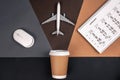 Paper cup, computer mouse, calendar and airplane model, top view. Royalty Free Stock Photo