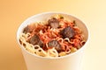 Paper cup with instant ramen noodles with beef and vegetables Royalty Free Stock Photo