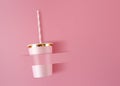 Paper Cup With Straws On Pink Celebration Background. Pink Cups Made From Cardboard For Party Style