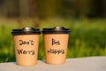 paper cup witn wrotten word on it Royalty Free Stock Photo