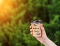 Paper cup witn wrotten word on it Royalty Free Stock Photo