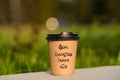 Paper cup witn wrotten word on it Royalty Free Stock Photo
