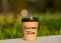paper cup witn wrotten word on it Royalty Free Stock Photo